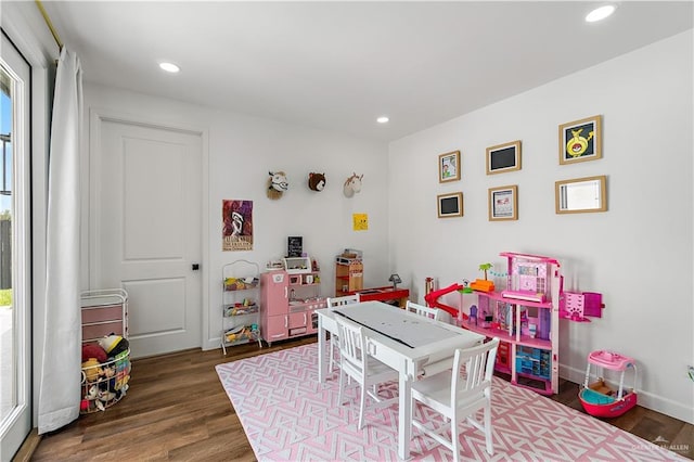 1801 E 28th St, Mission, TX 78574 - rec room featuring dark wood-style flooring and recessed lighting