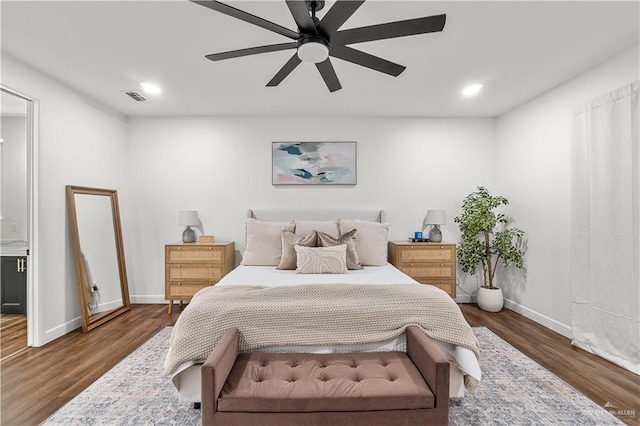 1801 E 28th St, Mission, TX 78574 - bedroom featuring baseboards, wood finished floors, recessed lighting, and a ceiling fan