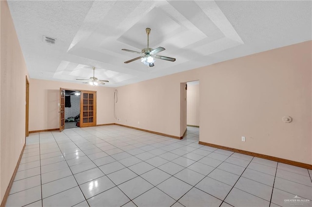 4113 Sonora Ave, Mcallen, TX 78503 - empty room featuring baseboards, visible vents, light tile patterned floors, and a raised ceiling