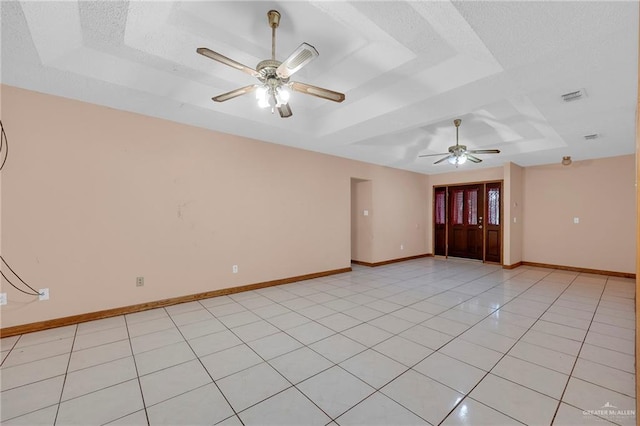 4113 Sonora Ave, Mcallen, TX 78503 - spare room with visible vents, baseboards, ceiling fan, a raised ceiling, and light tile patterned floors