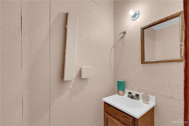4113 Sonora Ave, Mcallen, TX 78503 - bathroom with vanity and a textured wall