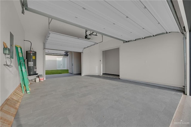 4712 S Waterford Ave, Edinburg, TX 78539 - garage with water heater, a garage door opener, and electric panel