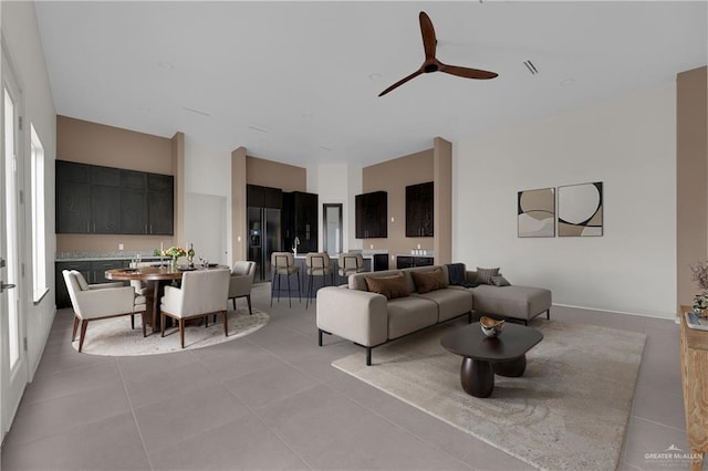 4712 S Waterford Ave, Edinburg, TX 78539 - living area with light tile patterned flooring and ceiling fan