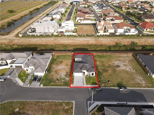 4712 S Waterford Ave, Edinburg, TX 78539 - aerial view of residential area with a nearby body of water and property boundaries highlighted