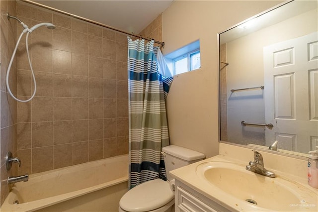 full bathroom featuring vanity, toilet, and shower / bath combo with shower curtain