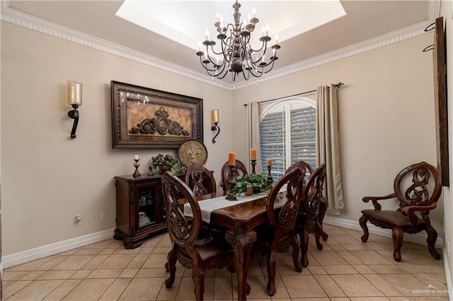 tiled dining room with an inviting chandelier and crown molding