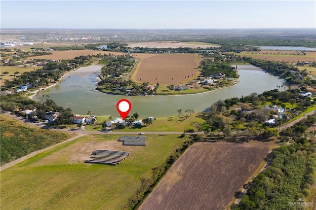 aerial view featuring a rural view and a water view