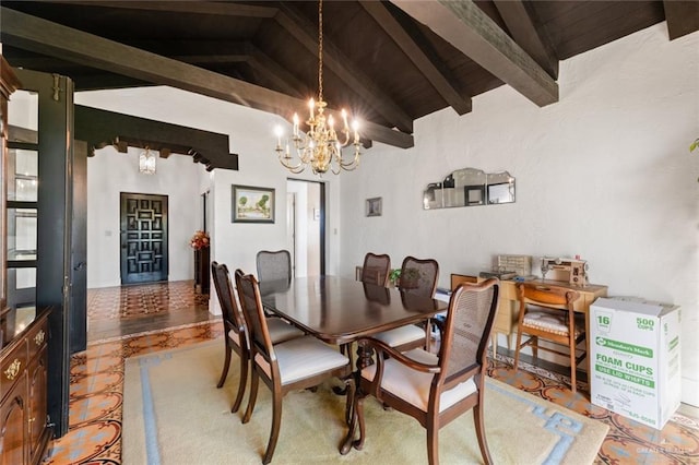 dining room featuring vaulted ceiling with beams, wooden ceiling, and a chandelier