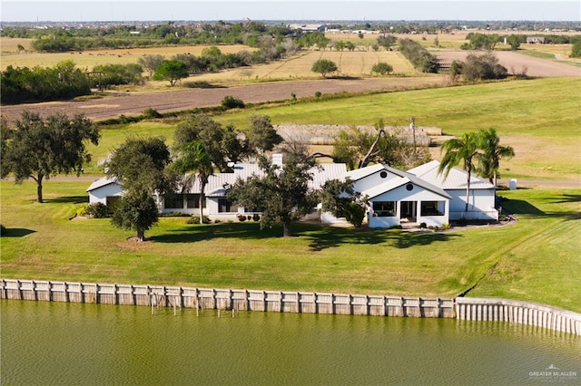 drone / aerial view featuring a water view and a rural view