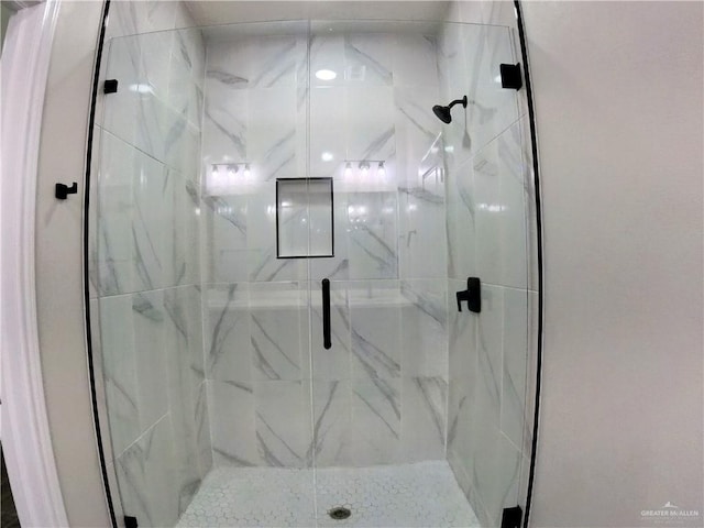 2602 Sunrise Ln, Weslaco, TX 78596 - bathroom featuring a marble finish shower