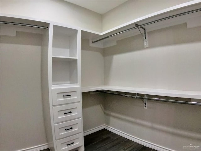 2602 Sunrise Ln, Weslaco, TX 78596 - walk in closet featuring dark wood-style floors