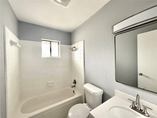 full bath with a textured wall, bathing tub / shower combination, vanity, and toilet