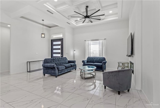 living room with a high ceiling, coffered ceiling, crown molding, ceiling fan, and beamed ceiling