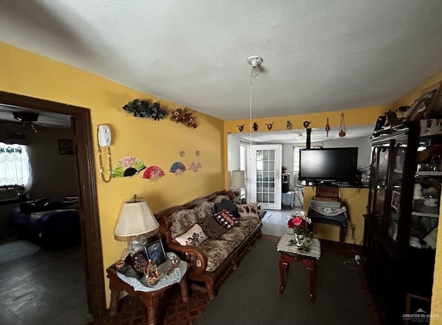 living room featuring ceiling fan