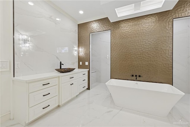 3910 La Hacienda St, Weslaco, TX 78596 - bathroom with crown molding, vanity, marble finish floor, and a freestanding bath