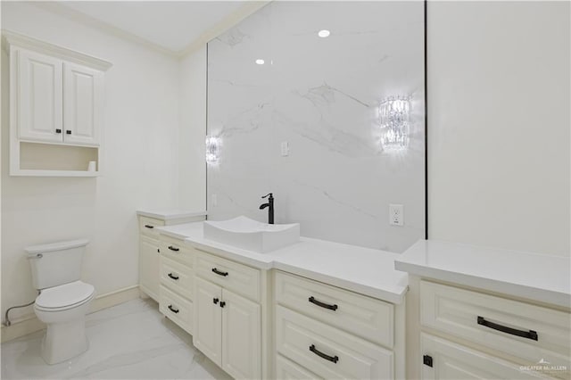 3910 La Hacienda St, Weslaco, TX 78596 - bathroom featuring crown molding, toilet, marble finish floor, and vanity