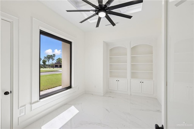 3910 La Hacienda St, Weslaco, TX 78596 - spare room with marble finish floor, baseboards, and ceiling fan