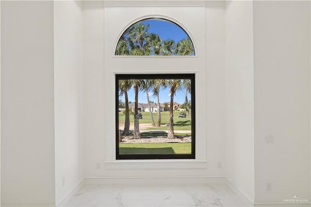 3910 La Hacienda St, Weslaco, TX 78596 - entryway featuring marble finish floor and baseboards