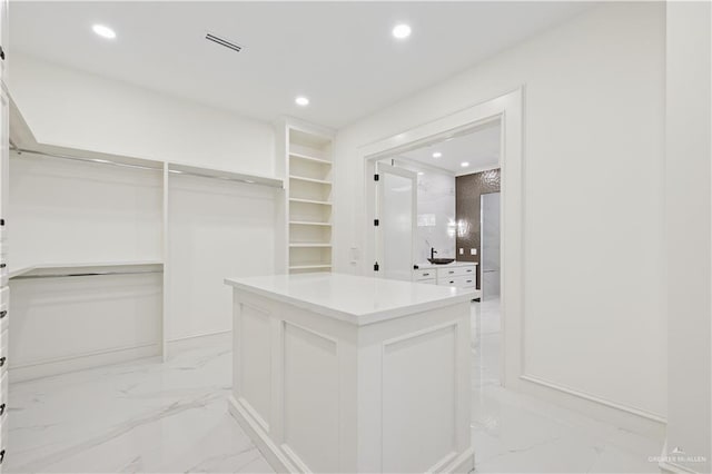3910 La Hacienda St, Weslaco, TX 78596 - spacious closet with marble finish floor and visible vents