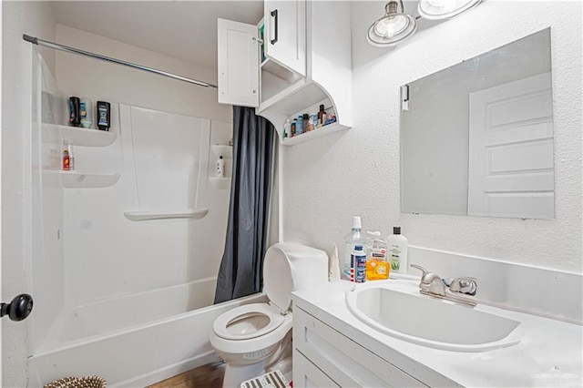 full bathroom featuring vanity, toilet, and shower / bath combo with shower curtain