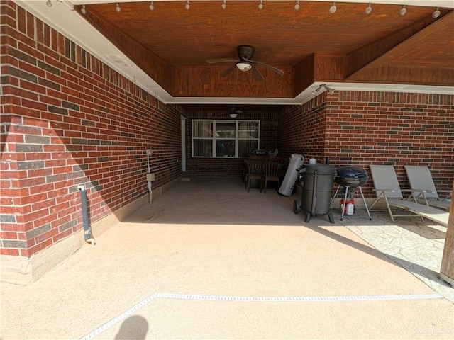 view of patio featuring ceiling fan