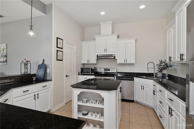 622 Comedy Ln, Edinburg, TX 78542 - kitchen featuring appliances with stainless steel finishes, a sink, under cabinet range hood, open shelves, and white cabinets