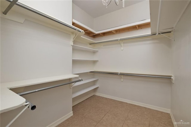 622 Comedy Ln, Edinburg, TX 78542 - spacious closet featuring light tile patterned floors