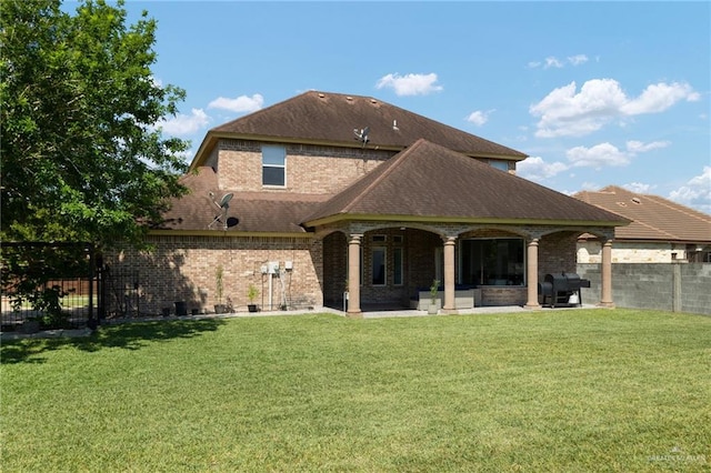 622 Comedy Ln, Edinburg, TX 78542 - back of property featuring a patio and brick siding