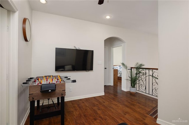 622 Comedy Ln, Edinburg, TX 78542 - sitting room with wood finished floors, arched walkways, baseboards, a desk, and recessed lighting
