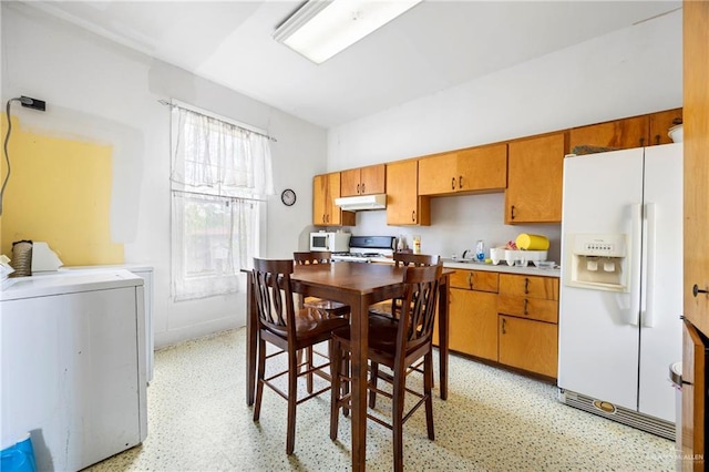 31375 N US Highway 281, Edinburg, TX 78542 - dining room featuring washer / clothes dryer and light flooring