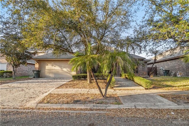 view of front of home with driveway and an attached garage