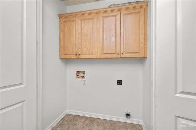 laundry area with washer hookup, cabinet space, baseboards, and hookup for an electric dryer