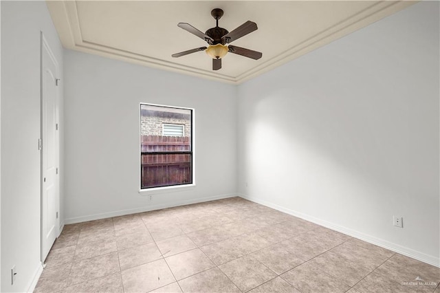 empty room with light tile patterned flooring, baseboards, and ceiling fan