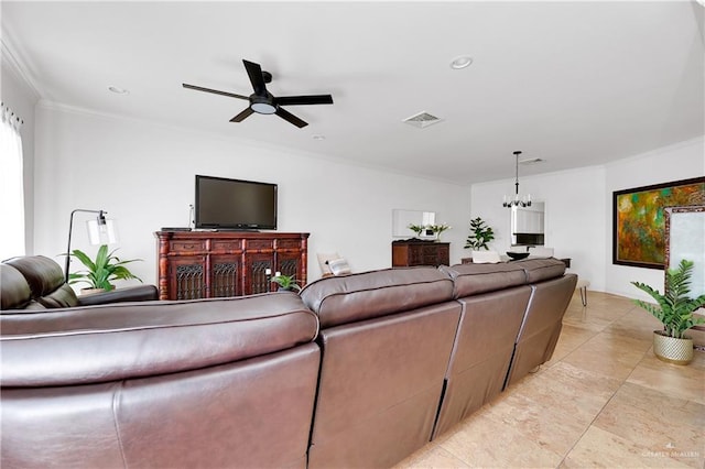 living room featuring ceiling fan with notable chandelier and ornamental molding