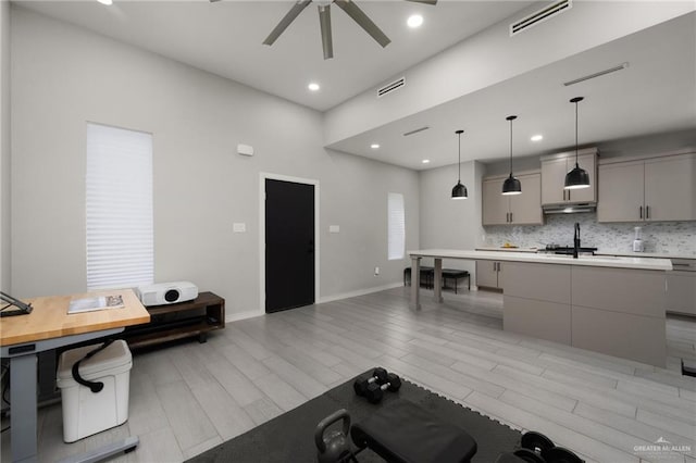323 Uva Ln, Brownsville, TX 78521 - interior space featuring light wood-style flooring, baseboards, ceiling fan, and visible vents