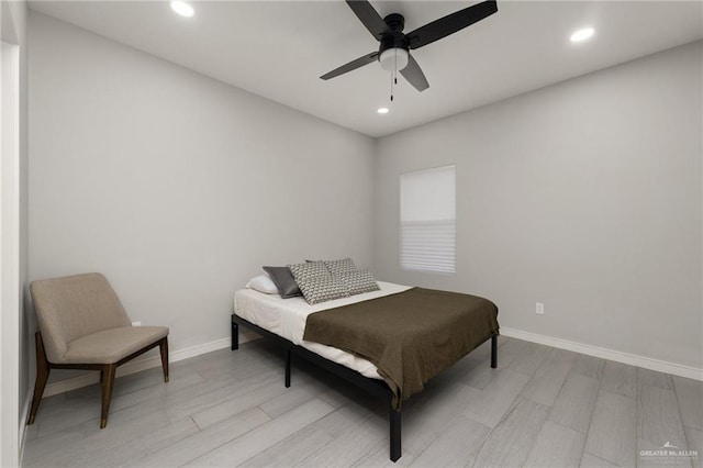 323 Uva Ln, Brownsville, TX 78521 - bedroom featuring ceiling fan, baseboards, light wood finished floors, and recessed lighting