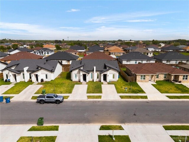 323 Uva Ln, Brownsville, TX 78521 - drone / aerial view with a residential view