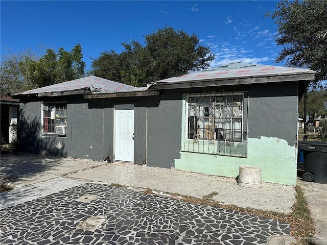 rear view of house with a patio area