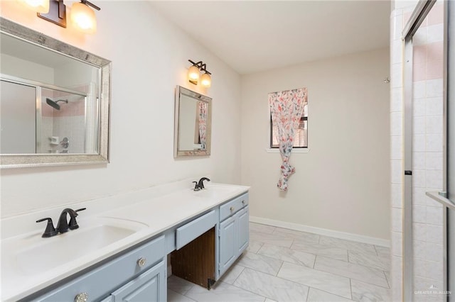 bathroom with walk in shower and vanity