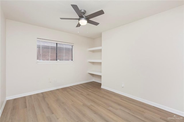 unfurnished room with ceiling fan and light hardwood / wood-style flooring