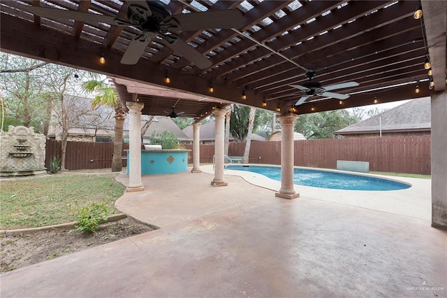 view of swimming pool featuring a pergola, a patio area, and ceiling fan