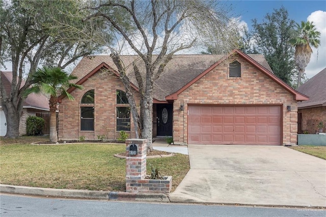 view of front of house featuring a garage and a front lawn