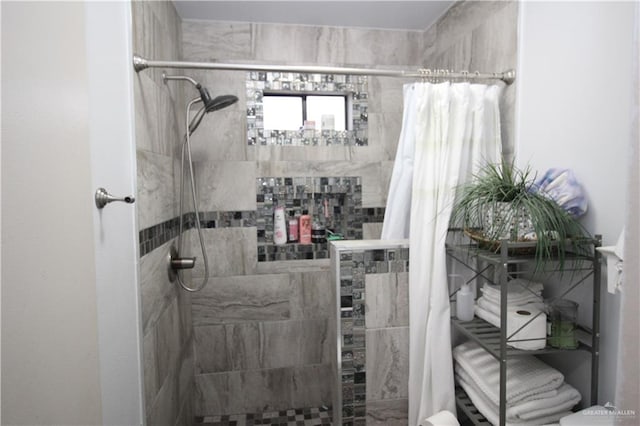 bathroom featuring walk in shower