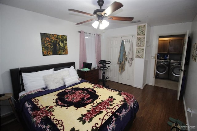 bedroom featuring ceiling fan, dark wood-type flooring, a closet, and washing machine and clothes dryer