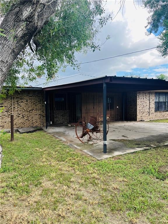 exterior space with a yard