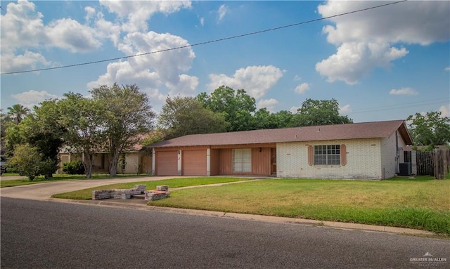 300 W Westway Ave, Mcallen, TX 78501 - ranch-style home with an attached garage, driveway, brick siding, and central AC