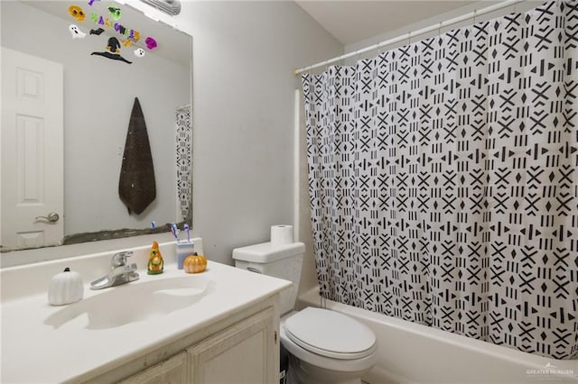 full bathroom featuring shower / bathtub combination with curtain, vanity, and toilet