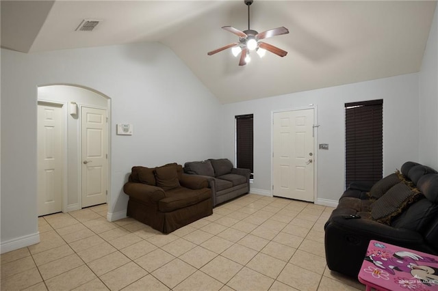 tiled living room featuring ceiling fan and lofted ceiling