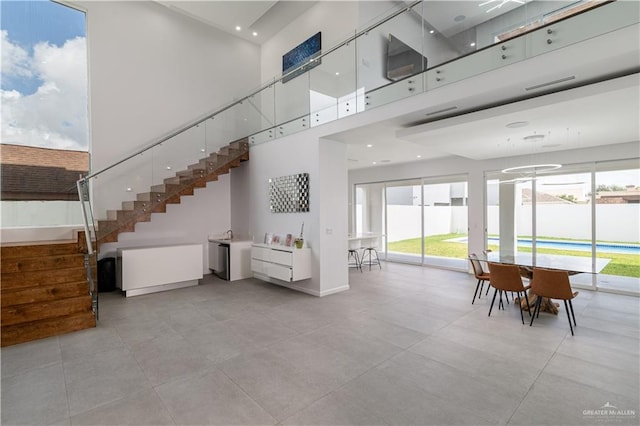 interior space with a towering ceiling