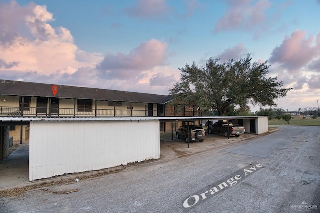 view of property exterior at dusk